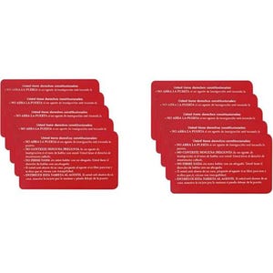 May include: Two stacks of rectangular red cards with white text in Spanish. Each card states: Usted tiene derechos constitucionales: NO ABRA LA PUERTA si un agente de inmigración está tocando la puerta. NO CONTESTE NINGUNA PREGUNTA. NO FIRME NADA.