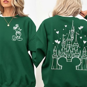 Retro magical castle sweatshirt inspired by Magic Kingdom and Walt Disney World, featuring a vintage style fairytale castle graphic with soft pastel tones, sparkling star details, and a cozy relaxed fit, perfect for Disney girls trips, family vacations, matching group outfits, birthday girl or birthday boy celebrations, and unforgettable theme park memories filled with magic, laughter, and castle dreams.