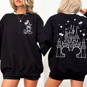 Retro magical castle sweatshirt inspired by Magic Kingdom and Walt Disney World, featuring a vintage style fairytale castle graphic with soft pastel tones, sparkling star details, and a cozy relaxed fit, perfect for Disney girls trips, family vacations, matching group outfits, birthday girl or birthday boy celebrations, and unforgettable theme park memories filled with magic, laughter, and castle dreams.