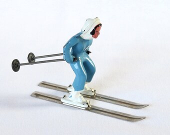 vintage lead figurine, Barclay, girl skier skiing, blue & white, miniature, in good condition, collectible figurines, Winter Sports