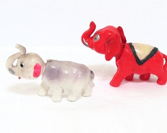 2 antique bobblehead elephants, celluloid, red and white mauve, collectible bobbleheads, collectible celluloid animals, vintage toys