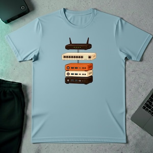 May include: A white ceramic mug with a black handle and the text "But First, Coffee" in a black, bold font. The mug is on a white surface. The mug is approximately 4 inches tall.