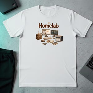 May include: White t-shirt featuring the word "Homelab" in brown, with a graphic of computer equipment. The design includes a server rack, monitors, keyboard, and other tech accessories, ideal for tech enthusiasts.