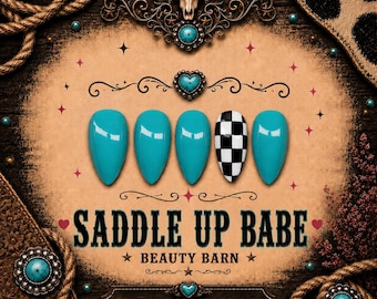 May include: Five almond-shaped press-on nails featuring four solid turquoise blue nails and one black and white checkered nail. The text reads SADDLE UP BABE BEAUTY BARN, HANDMADE WITH LOVE, REUSABLE, SALON QUALITY, CUSTOM SIZING, with a bull skull icon.