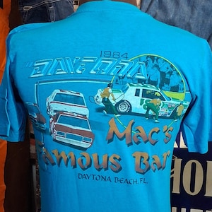 Camiseta vintage de 1984 del bar más famoso del mundo de Macs, en Fort Lauderdale, Florida, con estampado de motociclismo de los años 80 y bolsillo. Talla 40 M.