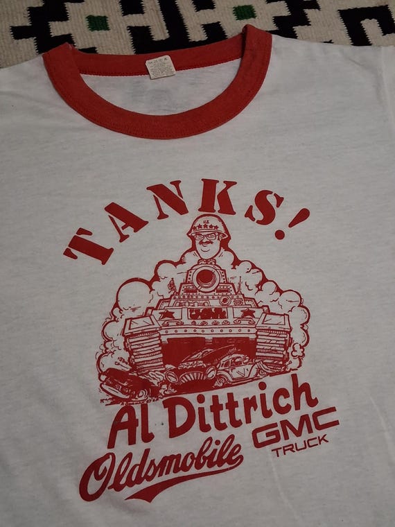 Vintage 80s TANKS Al Dittrich Oldsmobile Car Dealership Army Tank cartoon graphic soft paper thin single stitch ringer t shirt 40 M View 5