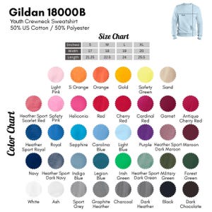 The image is a color chart for a youth crewneck sweatshirt, displaying various color options available in the Gildan 18000B collection.