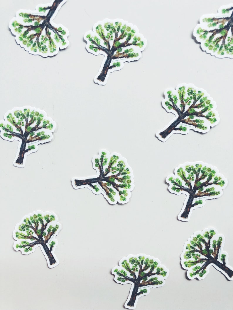 May include: A collection of tree stickers. Each sticker features a detailed illustration of a tree with a brown trunk and green foliage. The stickers are arranged on a light gray background.