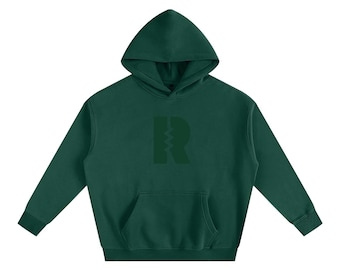 Wiederstehen Sie dem gewöhnlichen, übergroßen Fleece-Kapuzenpullover