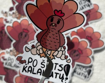 May include: A sticker featuring a cartoon turkey with a red wattle and a fanned tail in shades of red and brown. The turkey is surrounded by small chicks and the text "PO ŠITS KALATU!" is displayed on a white cloud-shaped banner.
