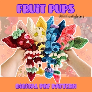 May include: A collection of colorful, crocheted fruit-themed puppy plushies. The plushies are in various colors, including red, yellow, blue, and green, with fruit-inspired designs. The text "FRUIT PUPS" and "DIGITAL PDF PATTERN" are displayed.