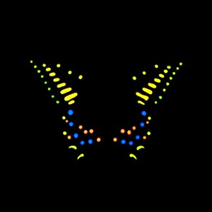 May include: A symmetrical graphic design on a black background featuring two mirrored wing-like shapes. The design is composed of small, glowing dots and dashes in vibrant shades of neon yellow, bright blue, and soft orange arranged in patterns.