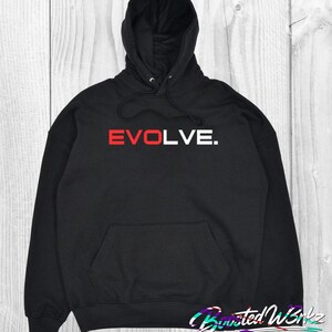 May include: Black hoodie with the word "EVOLVE." in red and white block letters across the chest. The sweatshirt features a front pocket and a drawstring hood. The bottom right corner has the text "Boosted Wrkz EST. 2023."