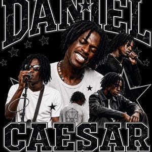 May include: A black graphic t-shirt featuring multiple images of Daniel Caesar. The design includes the text DANIEL CAESAR at the top and bottom, with SON OF SPERGY TOUR 2026 at the base. The imagery shows the artist singing and posing with stars.