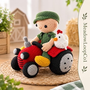 May include: A crocheted doll wearing a green cap and shirt, sitting on a red tractor with black wheels and a grey exhaust pipe. A small white chicken with a red comb and orange beak sits on the back of the tractor. The text MeadowLoopCo1 is visible.