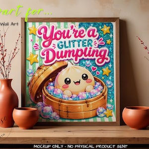 May include: A framed wall art print featuring a cartoon dumpling inside a bamboo steamer basket surrounded by iridescent bubbles and yellow stars. The text reads You're a GLITTER DUMPLING in pink and blue letters against a teal and white striped background.