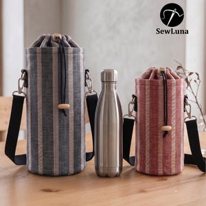 May include: Two water bottle carriers with black straps and a stainless steel water bottle. The carriers are striped, one in blue and white, the other in red and white. The carriers have a drawstring closure and wooden bead detail.