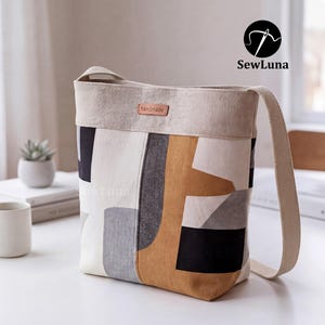 May include: A set of three ceramic mugs with a speckled, matte finish. The mugs are in shades of cream, light gray, and dark gray. Each mug has a simple, minimalist design and a rounded handle.