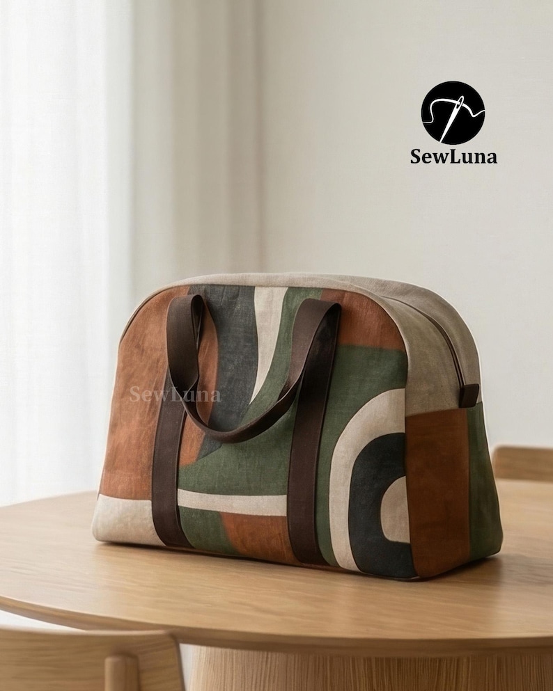 Handmade arched duffle bag sewing pattern featuring an earthy geometric print in terracotta, forest green, and charcoal. The modern weekender bag has dark brown wrap-around straps and sits on a beige background.