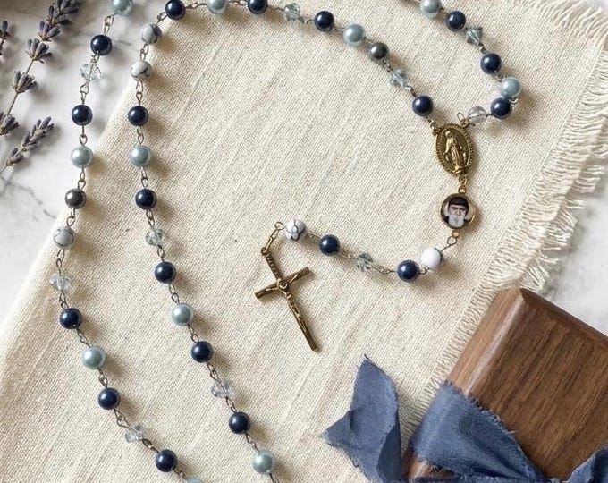 Rosary with gold Virgin Mary and Crucifix