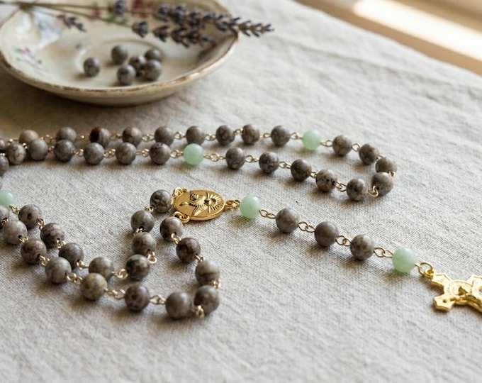 Rosary with Gold Holy Spirit center piece Crucifix