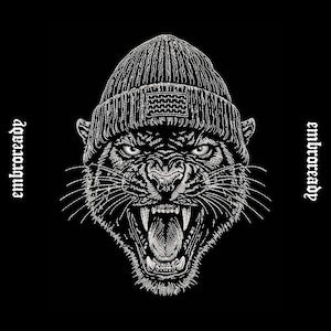 May include: A black and white illustration of a panther wearing a beanie, with the text "EMBROREADY" on either side. The panther is snarling, with its mouth open, revealing its teeth.