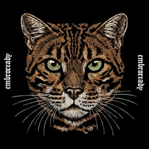May include: Embroidered image of a cat's face with green eyes and detailed fur in shades of brown and tan, set against a black background. The word "embroready" is written vertically on both sides of the image in a white, gothic font.