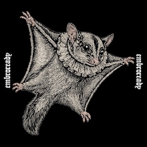 May include: A black and white graphic illustration of a sugar glider wearing a ruffled collar. The animal is depicted in mid-air with its gliding membrane extended. The text "embroready" is printed vertically on both the left and right sides.