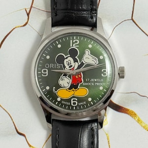 aiko オリス  ミッキーマウス アンティーク手巻き腕時計 ORIS - aiko様専用 オリス ミッキーマウス アンティーク手巻き腕時計の
