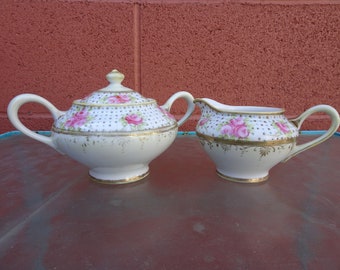 Ensemble sucrier et crémier en porcelaine