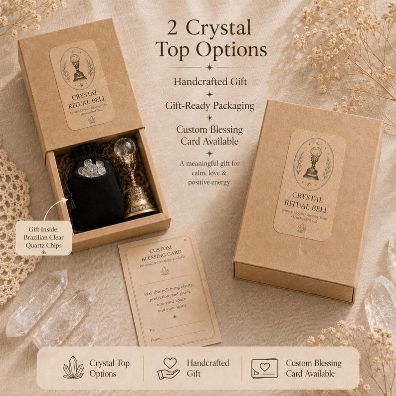 May include: A brown cardboard gift box containing a metal ritual bell with a clear crystal top and a black pouch filled with clear quartz chips. A custom blessing card is included, with text reading 2 Crystal Top Options, Crystal Ritual Bell, and Custom Blessing Card.