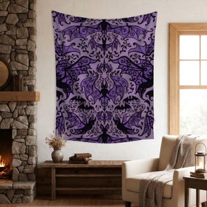 May include: A large, rectangular tapestry with a repeating pattern of black bats and swirling designs on a purple background. The tapestry is hanging on a wall, creating a decorative focal point in a room.