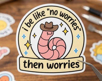 May include: A circular sticker featuring a pink worm wearing a brown cowboy hat. The text reads "i be like "no worries"" in an arc above the worm and "then worries" on a banner below. The design includes blue and yellow star accents.