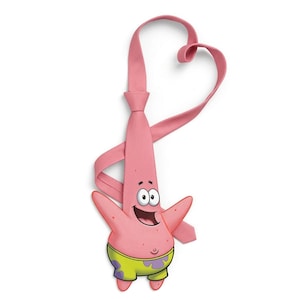 May include: A pink novelty tie featuring Patrick Star from Spongebob Squarepants. The tie has a heart-shaped design at the top and Patrick's face and arms at the bottom. Patrick is wearing yellow shorts with purple accents.