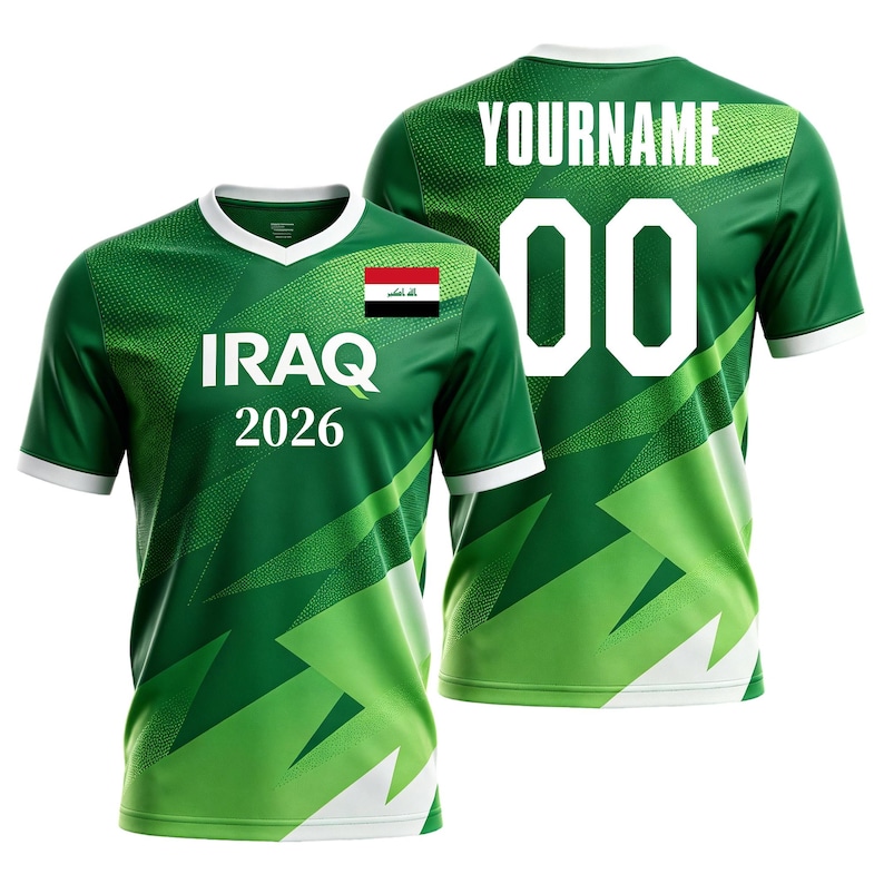 May include: Green and white soccer jersey with the word "IRAQ" and the number "2026" printed on the front. The jersey also features the Iraqi flag and the number "00" on the back. The text "YOURNAME" is printed above the number.