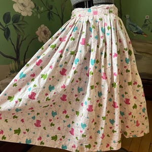 1950s Light Pink Novelty Print Cotton Skirt with Pink and Blue shirts and hangers, gathered swing skirt