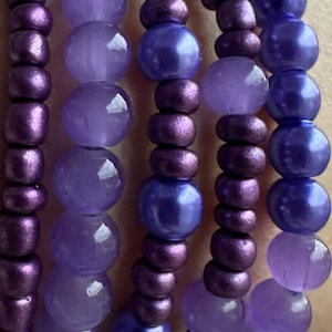 Lila pärlbesatta armbandsset, presentarmbandsset, flerfärgat lila armbandsset