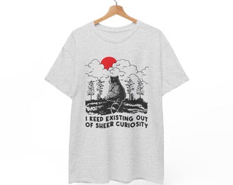 Funny Existential Raccoon T-Shirt | 'I Keep Existing Out of Sheer Curiosity'