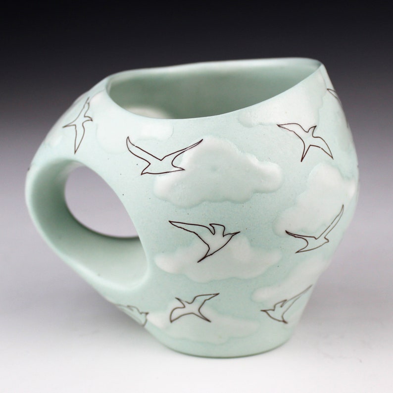 Green Mug with White Clouds and Birds