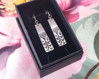 Stainless steel earrings. Made with vintage cutlery. 1960s (Carlyle)
