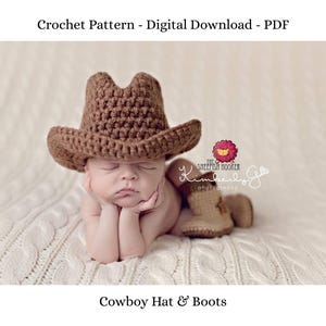 May include: A newborn baby wearing a crocheted brown cowboy hat and matching boots. The baby is lying on a white textured blanket. The image includes the text "Crochet Pattern - Digital Download - PDF" and "Cowboy Hat & Boots".
