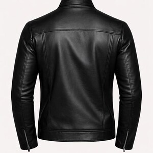May include: Black leather jacket with a stand-up collar and zippered sleeves. The back view shows a tailored fit with a horizontal seam across the upper back. A classic, stylish outerwear piece.