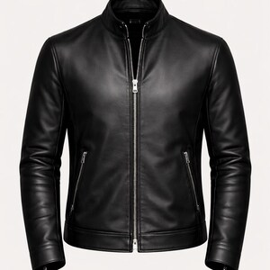 May include: Black leather jacket with a stand-up collar and a full-length zipper. The jacket has two zippered pockets on the front and long sleeves. A classic outerwear piece.
