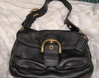 Black vintage Coach Soho shoulder bag. Handcrafted in black leather