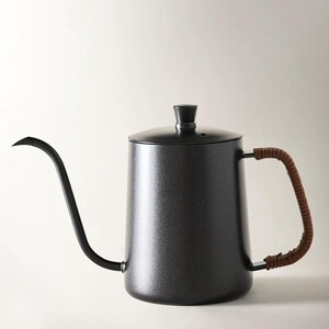 May include: A matte black gooseneck kettle with a long, curved spout and a brown wrapped handle. The kettle has a lid with a small black knob. This coffee brewing kettle is designed for pour-over coffee.