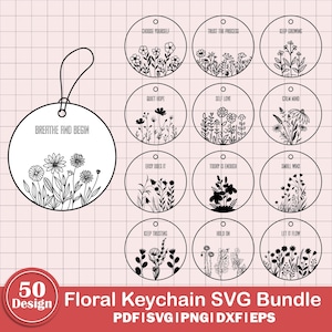 May include: A digital design bundle featuring 50 floral keychain designs. The designs include floral illustrations and inspirational phrases like "Breathe and Begin" and "Choose Yourself". The bundle includes PDF, SVG, PNG, DXF, and EPS formats.