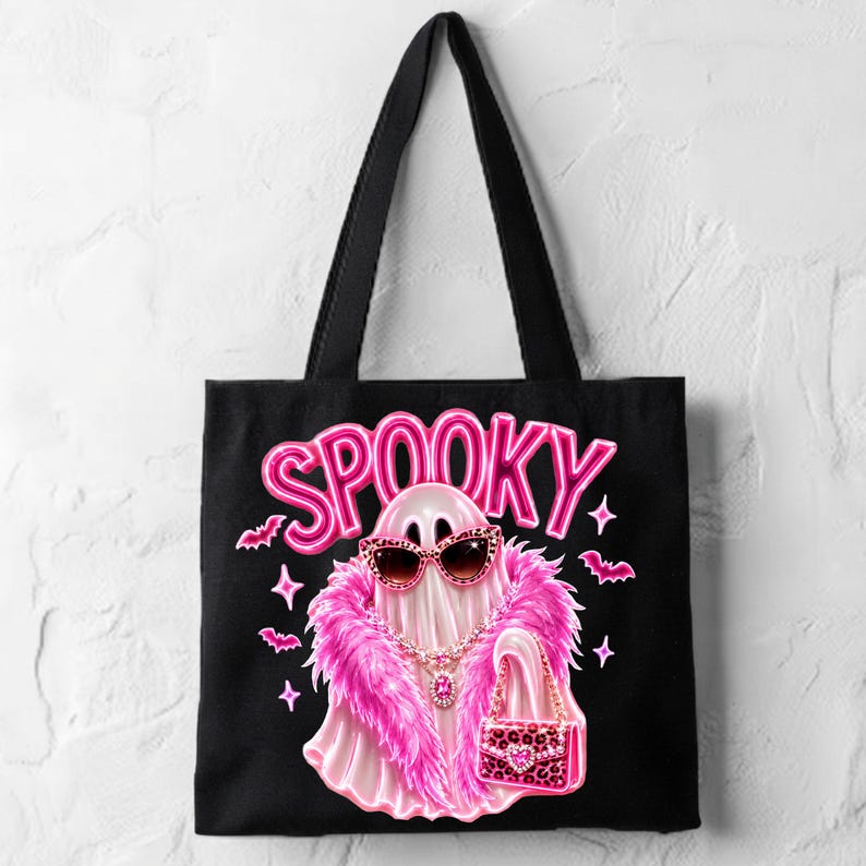 Pink Spooky Ghost PNG displayed on a Halloween shirt with glamorous leopard accessories and bold neon spooky text.