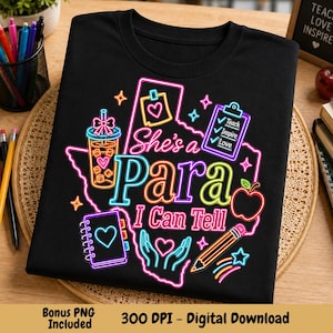 May include: A black t-shirt featuring a neon-style graphic of the state of Texas. The design includes a drink cup, a clipboard with the text Teach Inspire Love, a notebook, hands, and a pencil, with the text She's a Para I Can Tell in neon colors.
