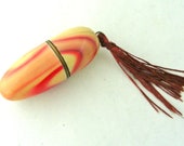 Antique vintage brass marble laquered bullet shape thimble spool case