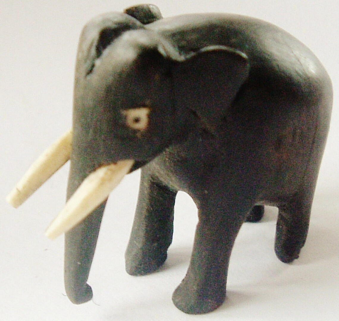 Ebony and ivory elephant hand carved small figure. Etsy
